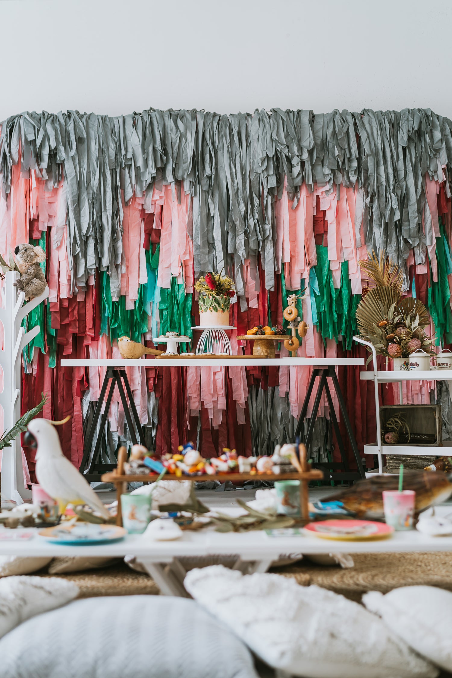 Australian inspired childrens party with lots of streamers koalas and native flora and fauna