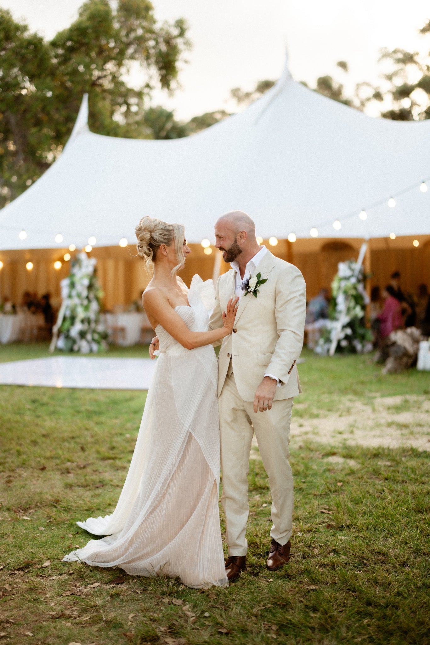 Perth Award Winning Wedding Planner, with beige marquee, tables and chairs wedding in background. 