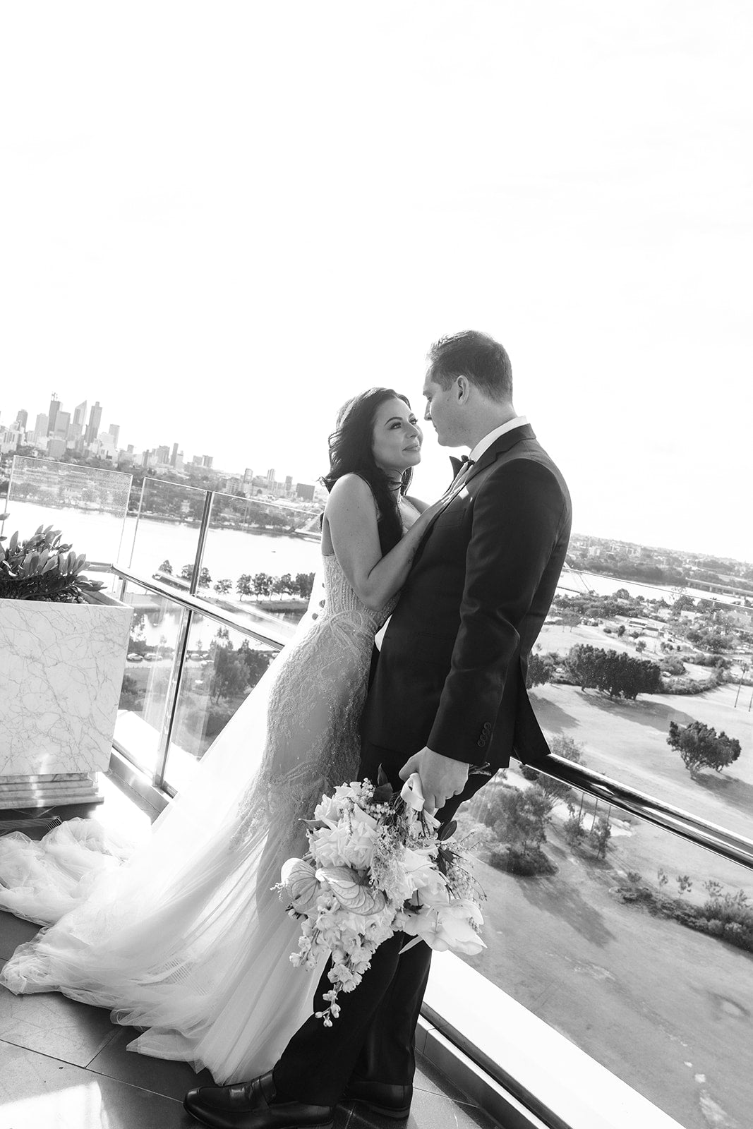 Bride and groom portrait overlooking Perth city at Crown Perth