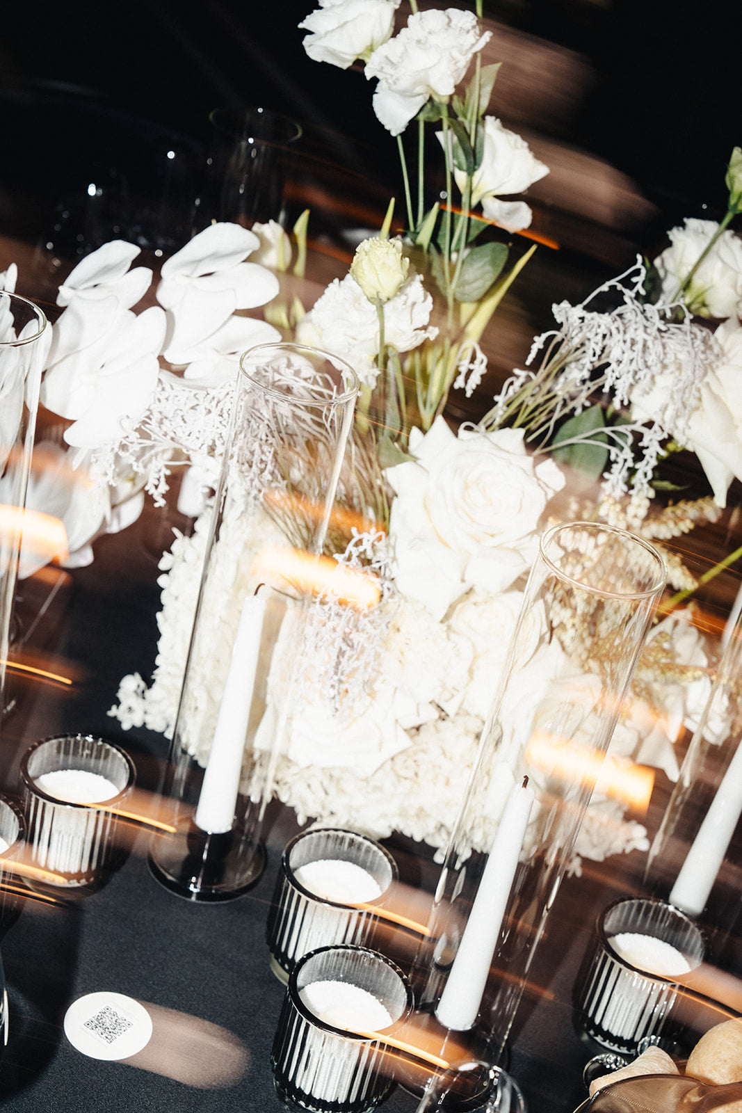 Editorial floral and candle styling detail at Crown Perth wedding