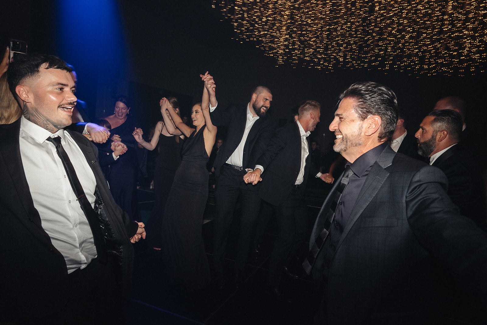 Wedding guests dancing during Crown Perth wedding reception